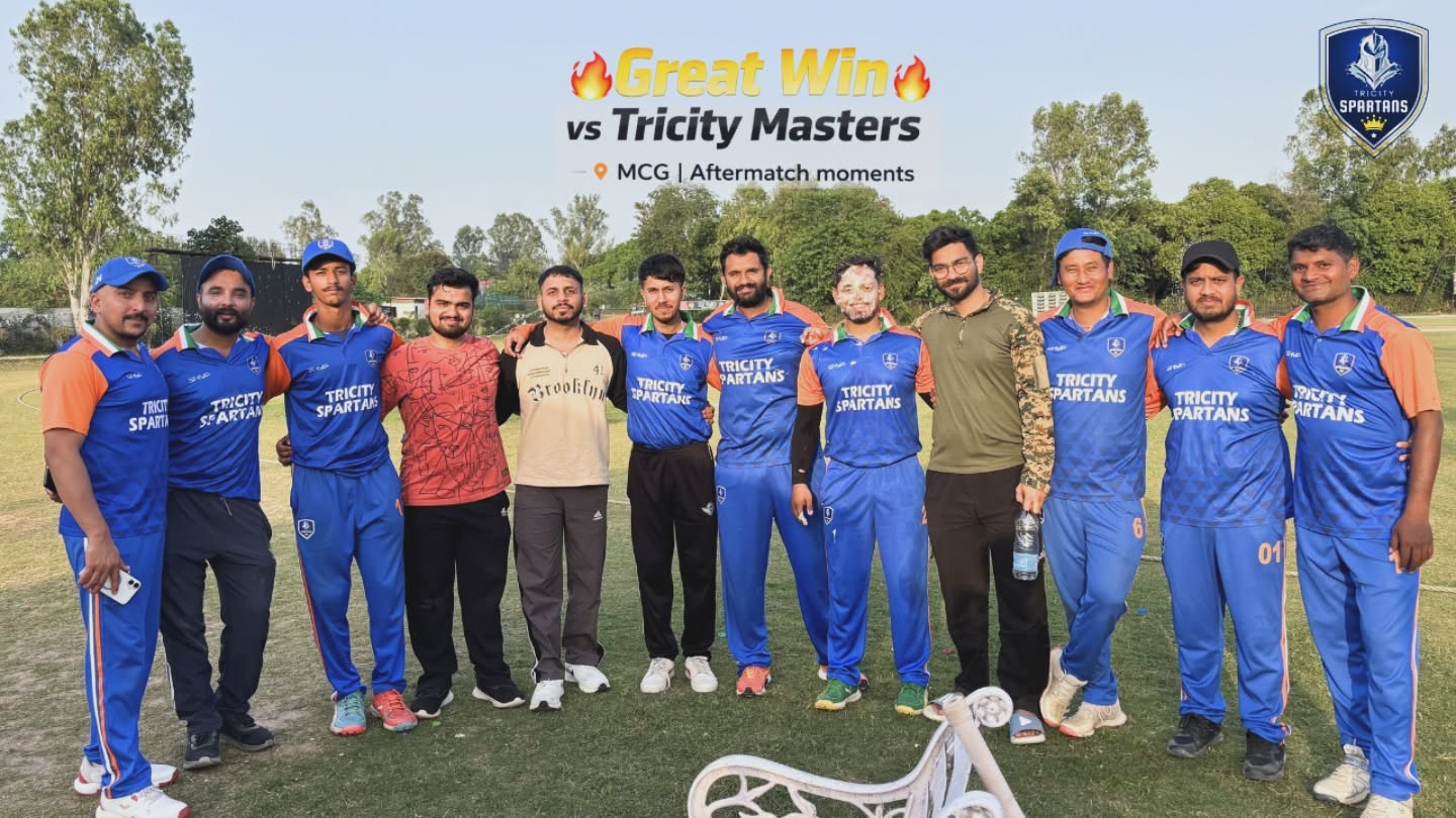 Tricity Spartans team together on the cricket ground in blue jerseys